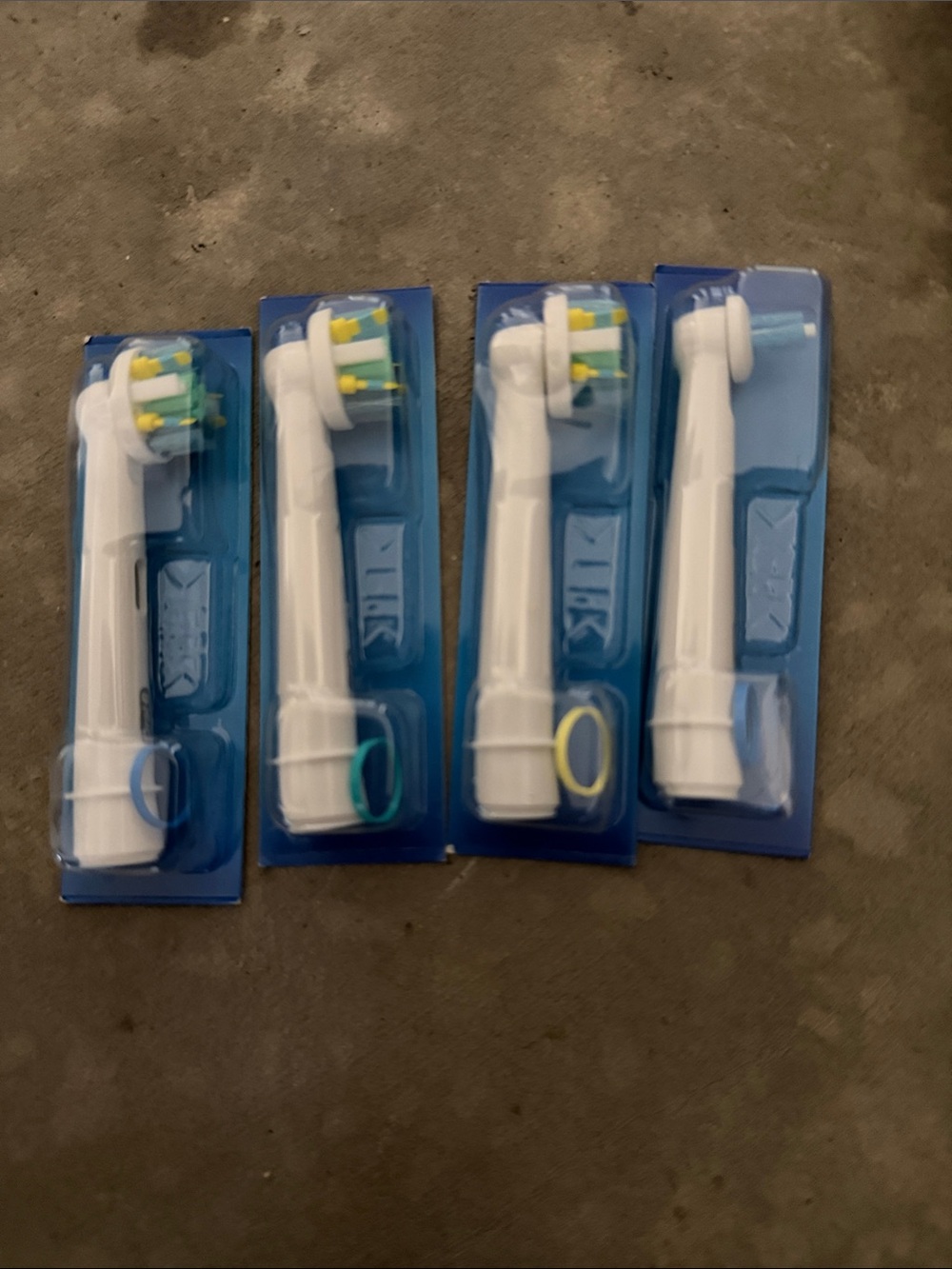 Oral B Floss Action and Ortho/Implant Head. New